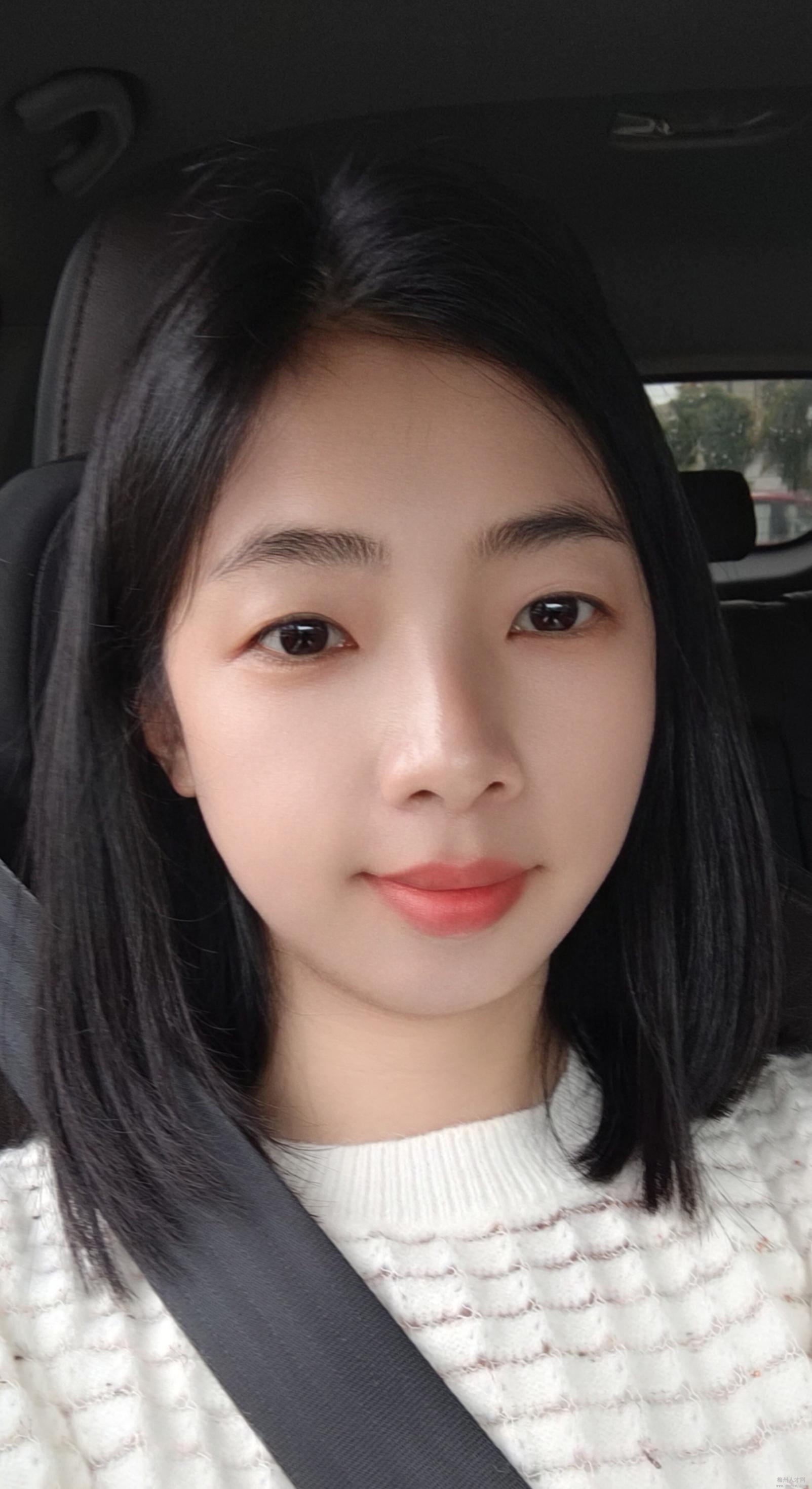 梁女士
